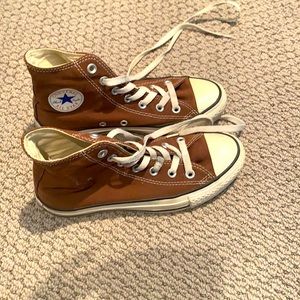Brown converse high tops